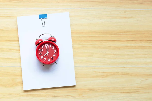 Office Paper Red Alarm Clock Wooden Table Background Top View — Stock Photo, Image