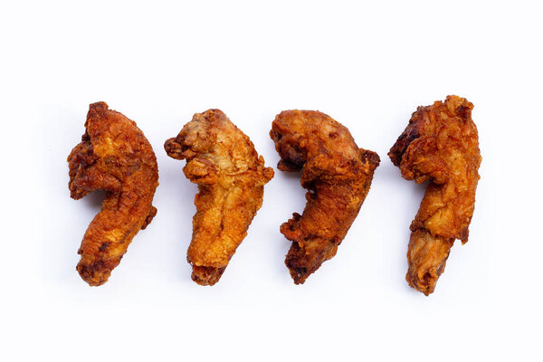 Fried chicken necks on white background.