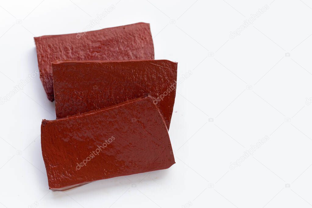 Pork blood pudding in white plate on white background.