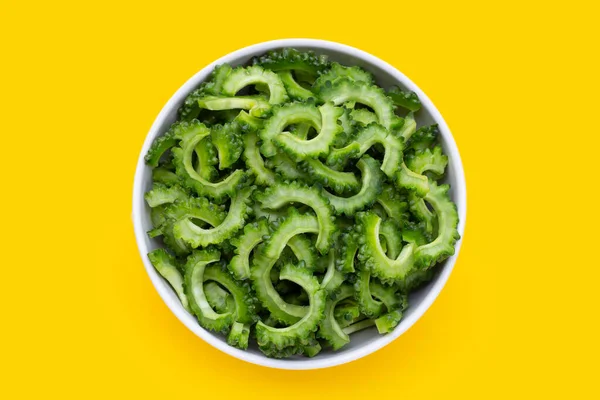 Sliced Bitter Gourd White Bowl Yellow Background — Stock Photo, Image