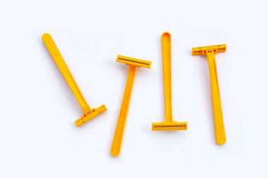 Beyaz arka plan üzerinde izole turuncu tıraş jilet