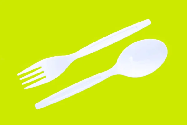 Plastic Fork Spoon Green Background — Stock Photo, Image