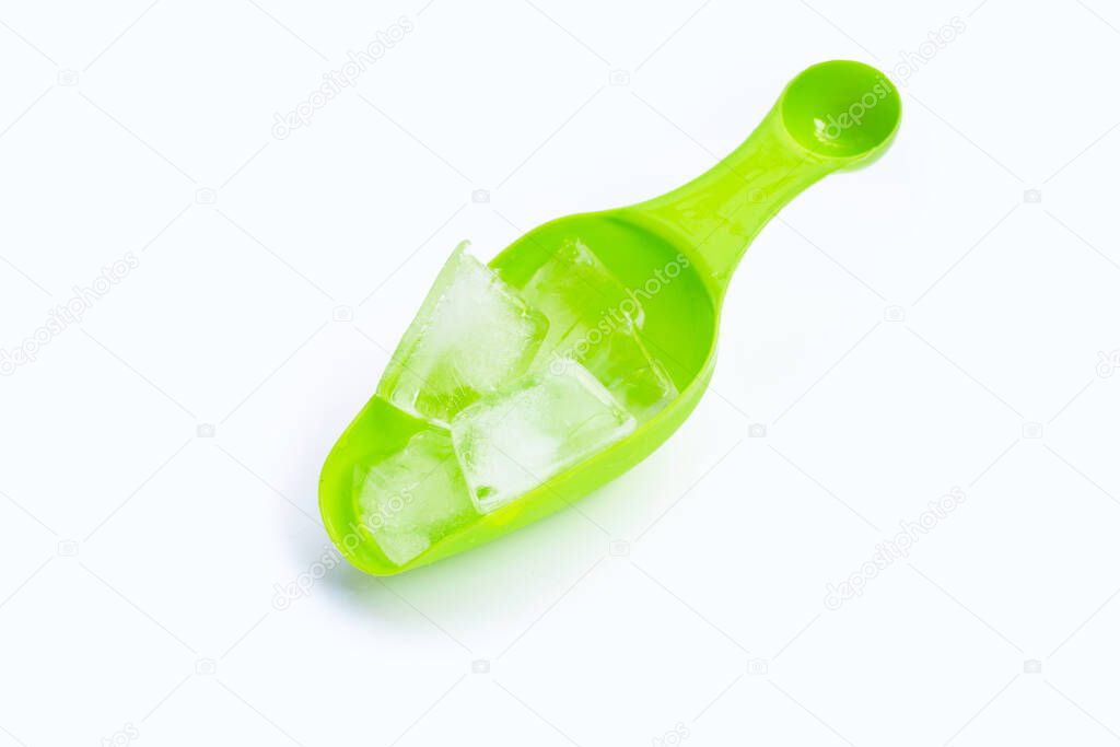 Ice cubes in green ice scoop.
