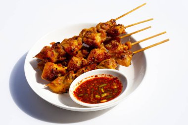 Chicken butt grilled on white background.