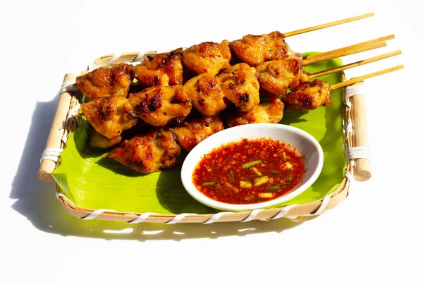 Chicken butt grilled on white background.