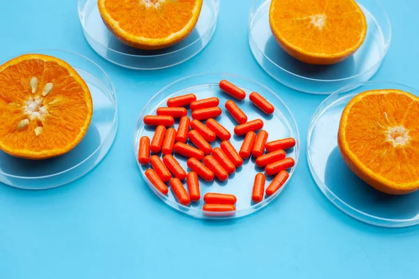 Vitamin Pills Fresh Orange Citrus Fruit Blue Background — Stock Photo, Image