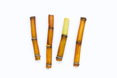 Beyaz zemin üzerine şeker kamışı.