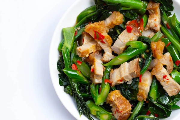 stock image Stir fried chinese kale with crispy pork belly