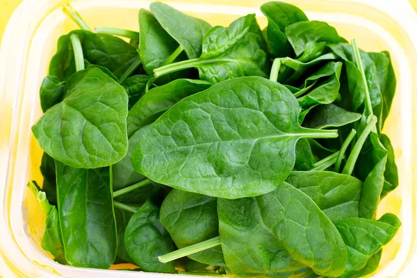 Spinach Leaves Yellow Background — Stock Photo, Image