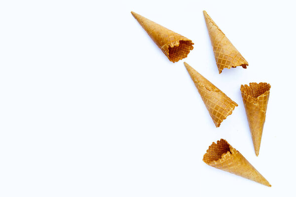 Empty ice cream cone on white background.
