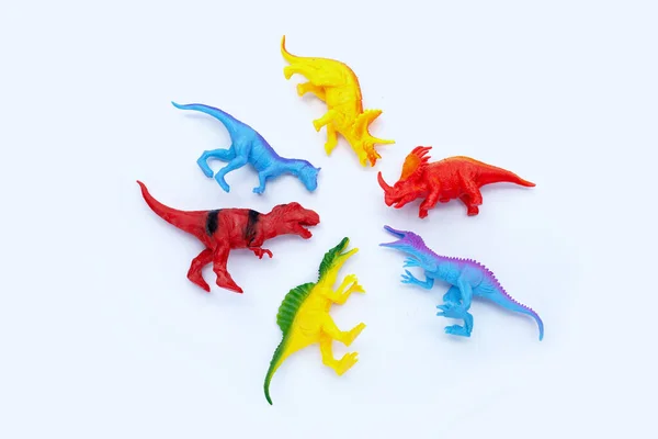 白色背景的塑料恐龙玩具 顶部视图 — 图库照片