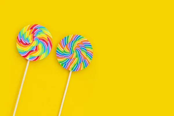 Rainbow Lollipop Yellow Background — Stock Photo, Image