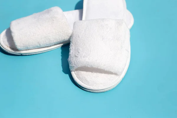 Hotel Slippers Blue Background Copy Space — Stock Photo, Image
