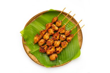 Chicken butt grilled on white background.