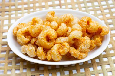 Crispy pork rinds or pork snack.