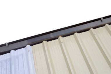 Roof with rain water gutter. Roof repair, steel sheet. Stop a roof leak