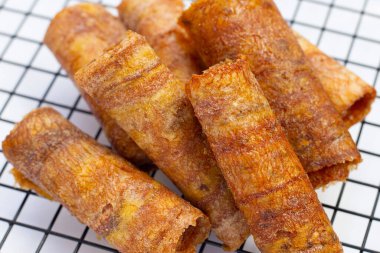 Sun dried banana roll snacks