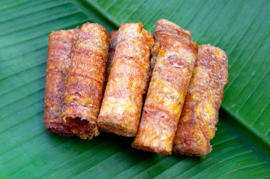 Sun dried banana roll snacks
