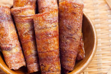 Sun dried banana roll snacks