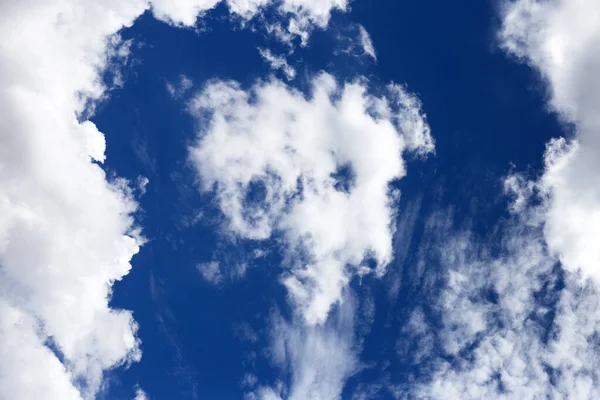 Blue sky with white clouds, Skull shape