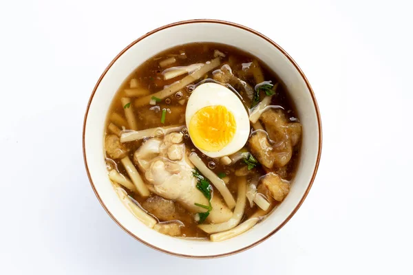 Fish maw soup on white background.