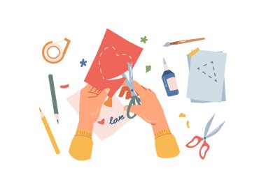 Sanat dersi, kalp kesen eller, yapıştırıcı, makas.