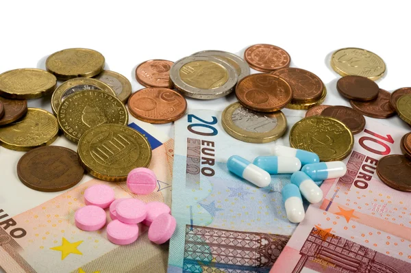 Geneesmiddelen en geld — Stockfoto