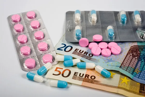 Medicines and money — Stock Photo, Image