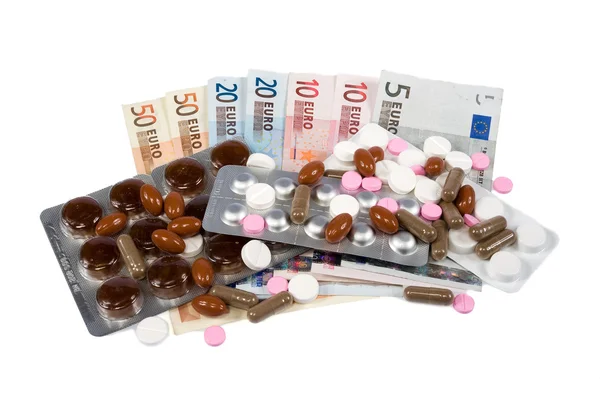 Geneesmiddelen en geld — Stockfoto