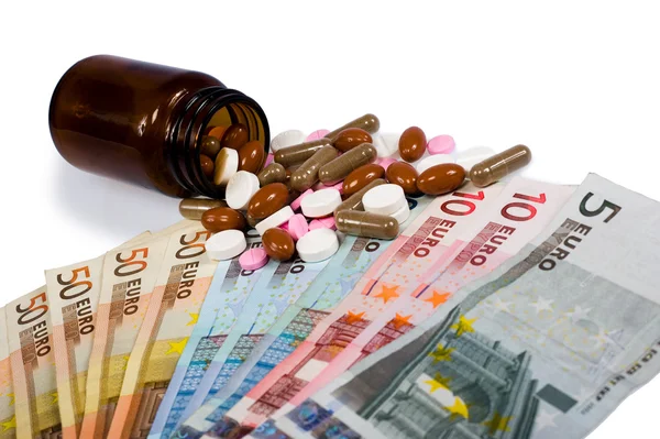 Geneesmiddelen en geld — Stockfoto