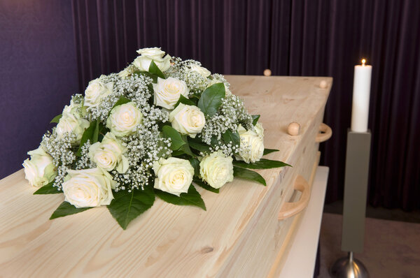 Flower arrangement on coffin