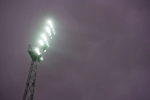 Spotlight in stadium — Stock Photo, Image