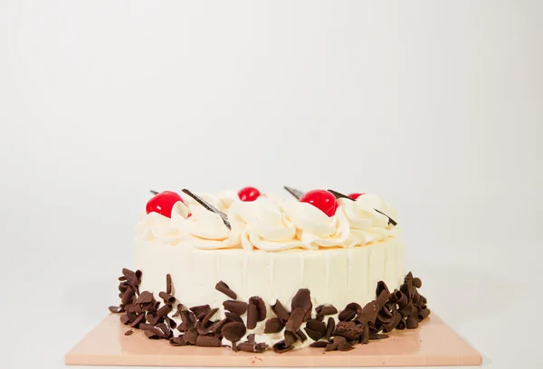 Cake and cherries on top — Stockfoto