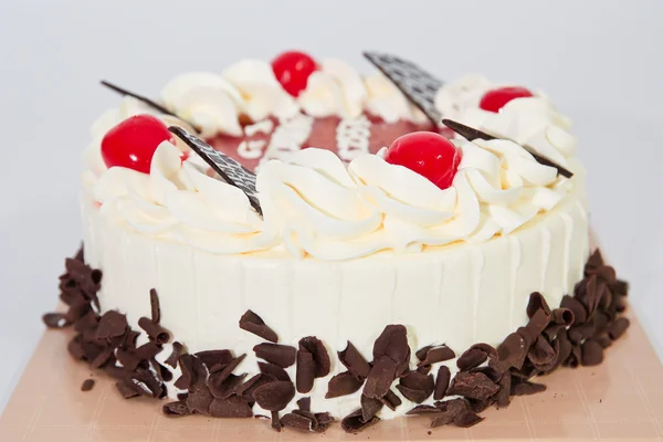 Cake and cherries on top — Stockfoto