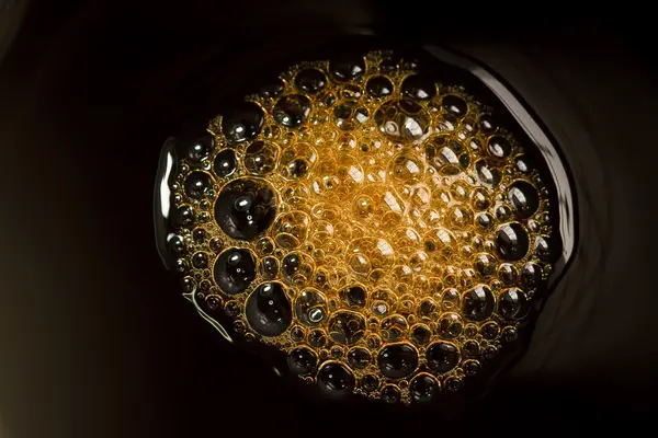 Bubbles in a cup of coffee. — Stock Photo, Image