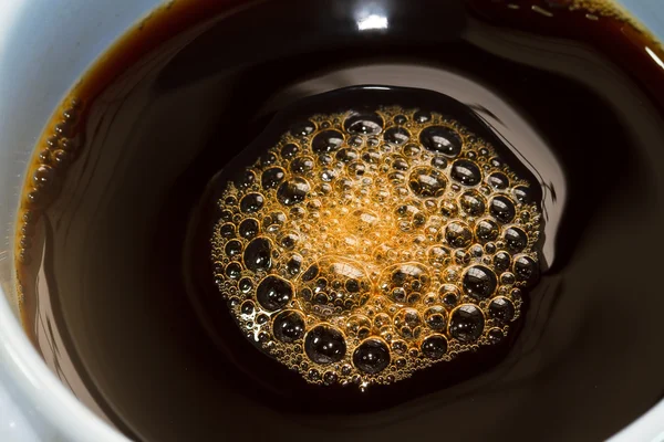 Bubbles in a cup of coffee. — Stock Photo, Image