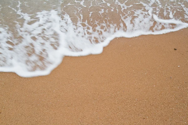Sea wave over sand — Stock Photo, Image