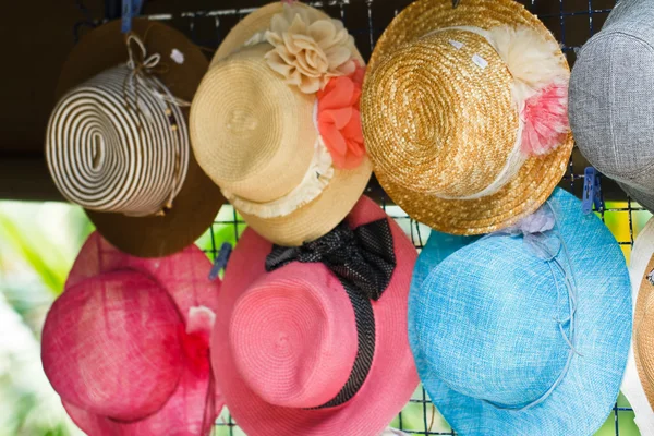 Pretty straw hat with flower — Stock Photo, Image