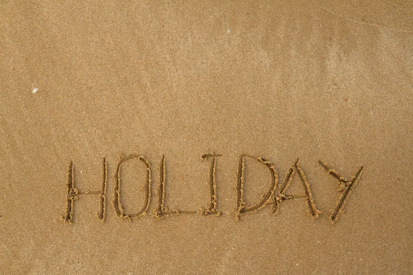 Happy Holidays Message on Beach Royalty Free Stock Photos