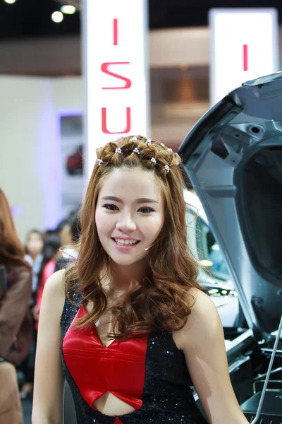 BANGKOK - MARCH 30 : Unidentified models present with Isuzu car — Stock Photo, Image