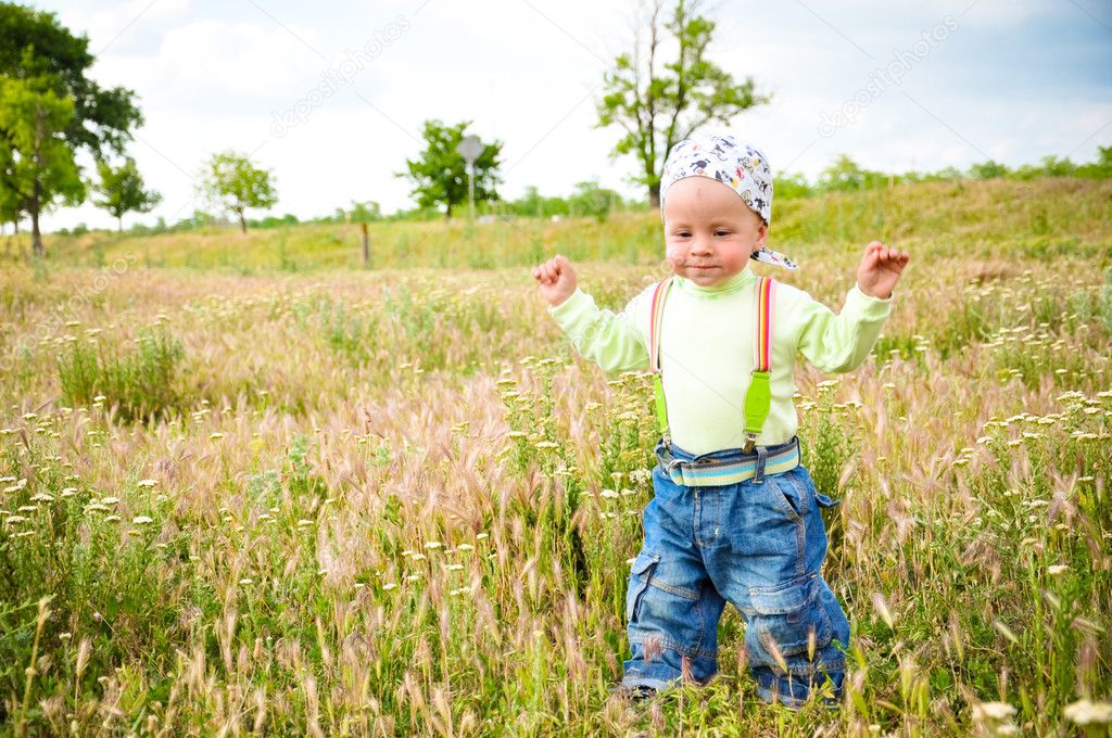 The child on a grass