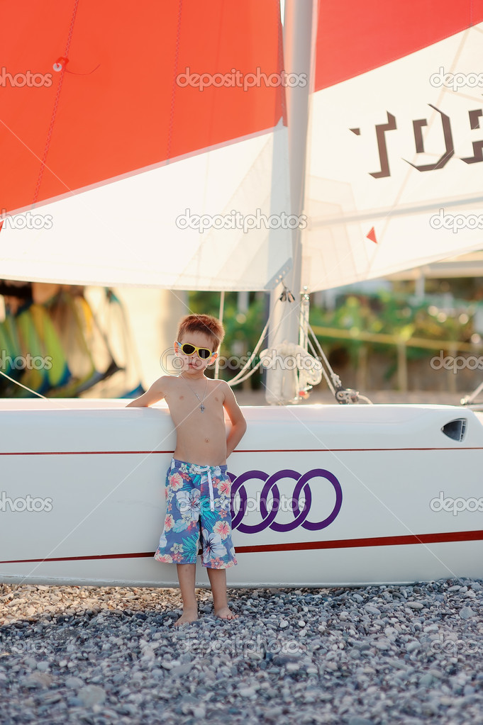 boy and boats