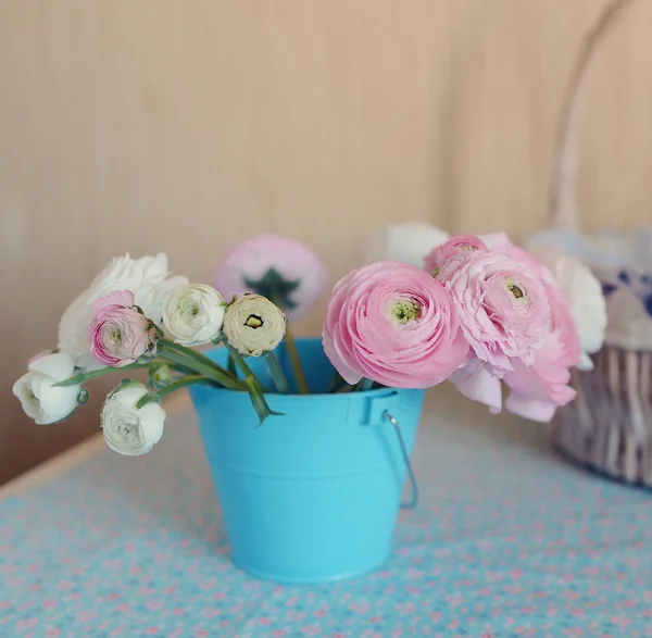 Bouquet in a bucket — Stock Photo, Image