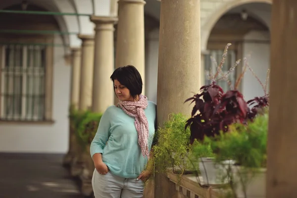 Woman at the stone pillars — Stock Photo, Image