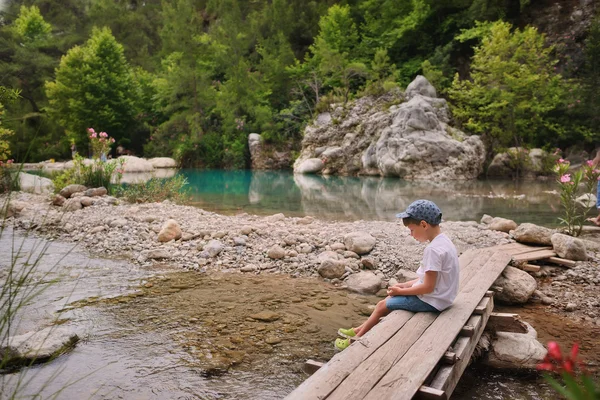 Boy on bridge — Stock Photo, Image