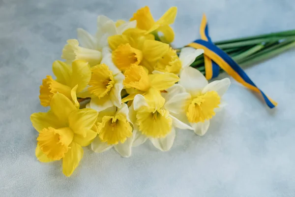 yellow flowers and the flag of Ukraine, Ukrainian symbols