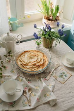 homemade apple pie in light colors in a transparent form, high quality