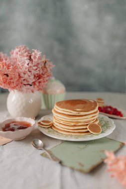 pancakes for breakfast made at home with jam or honey