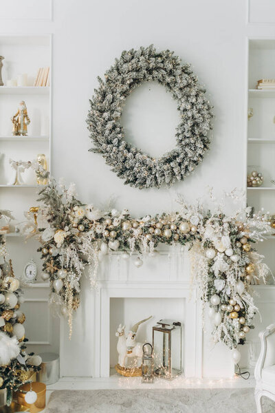 New Year's decor, festive home interior in white tones with gold