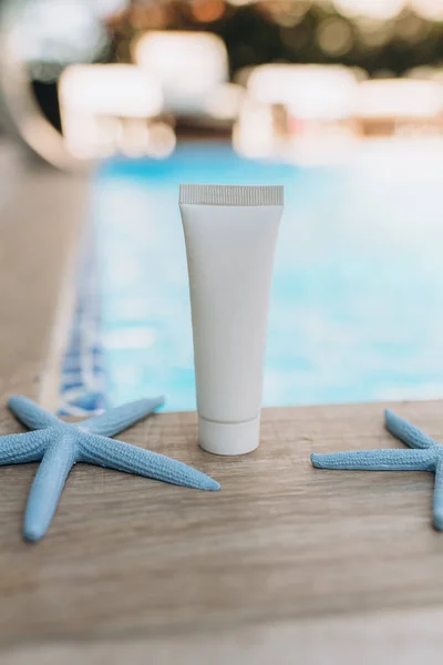 mockup of a tube for cream, packaging on a white background, sunscreen mocap, cream on a marine theme